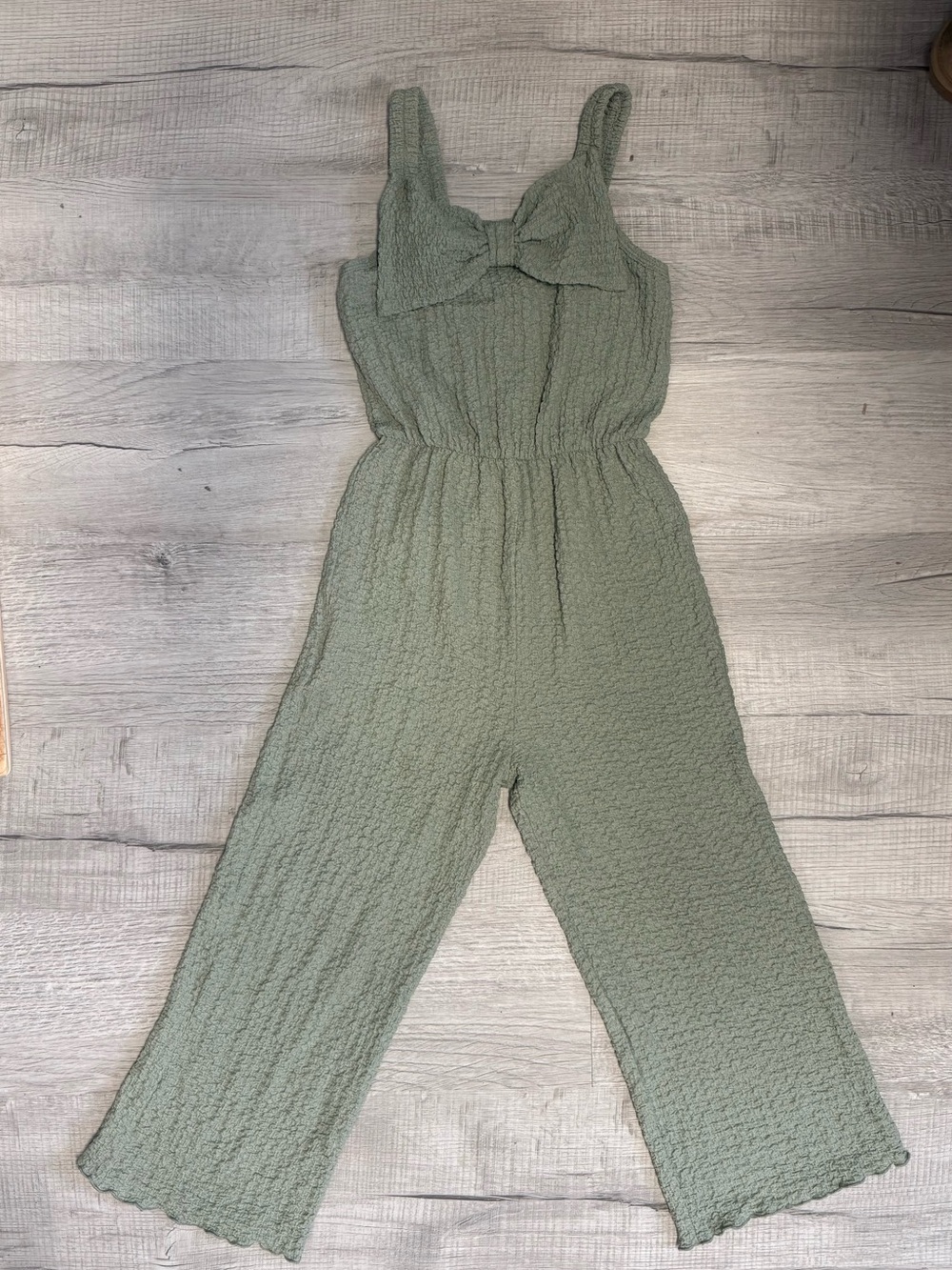 Lily Bleu Sage Green Textured Sleeveless Jumpsuit with Front Bow